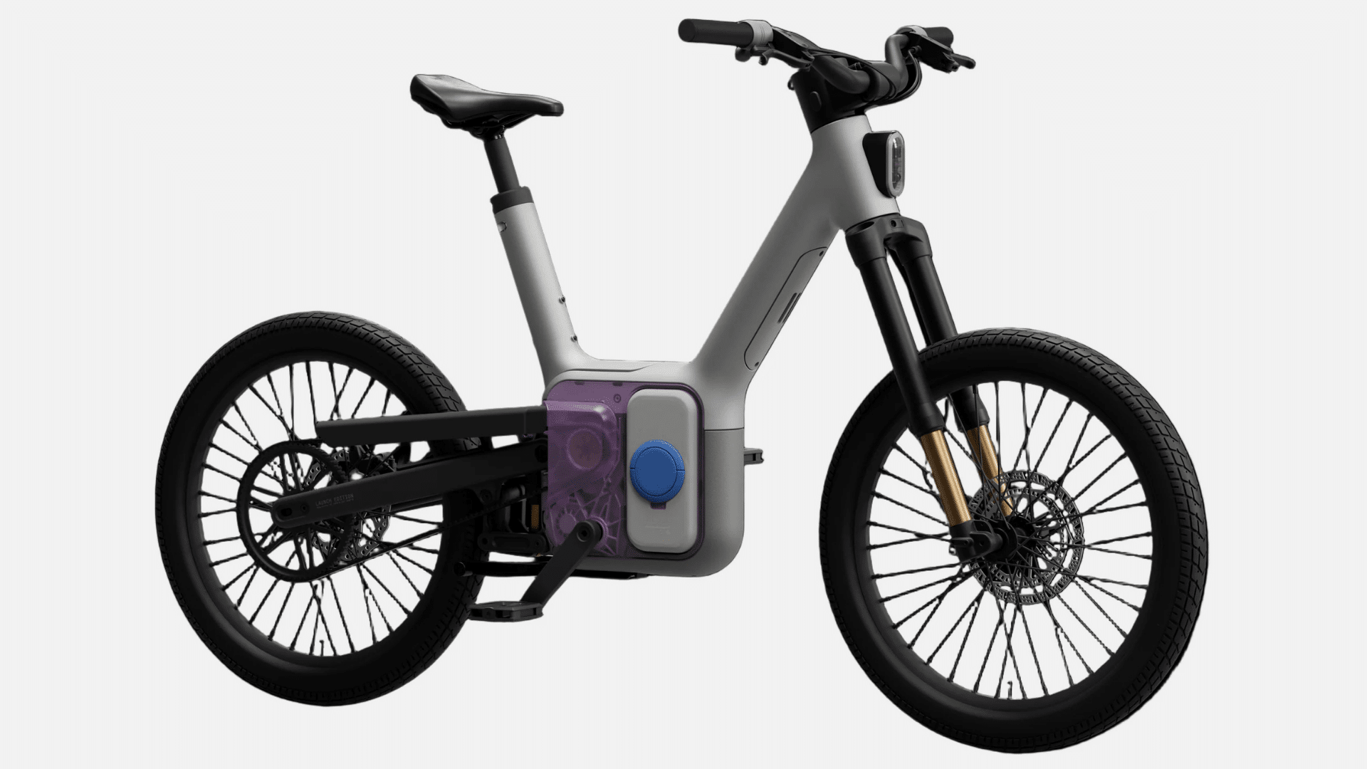 Vélo électrique Also TM-B de Rivian en studio, cadre ouvert, suspensions avant/arrière, pneus larges.