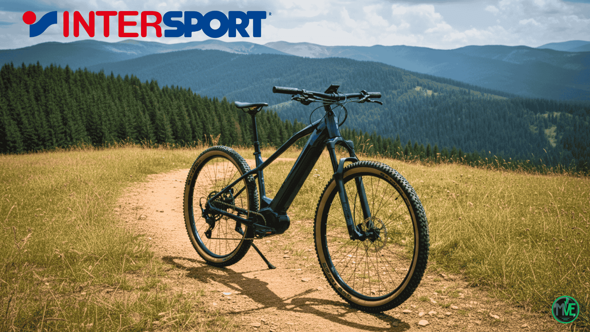 VTT électrique Nakamura E-SUMMIT 960 sur un chemin de montagne – nouveau modèle Intersport 2025